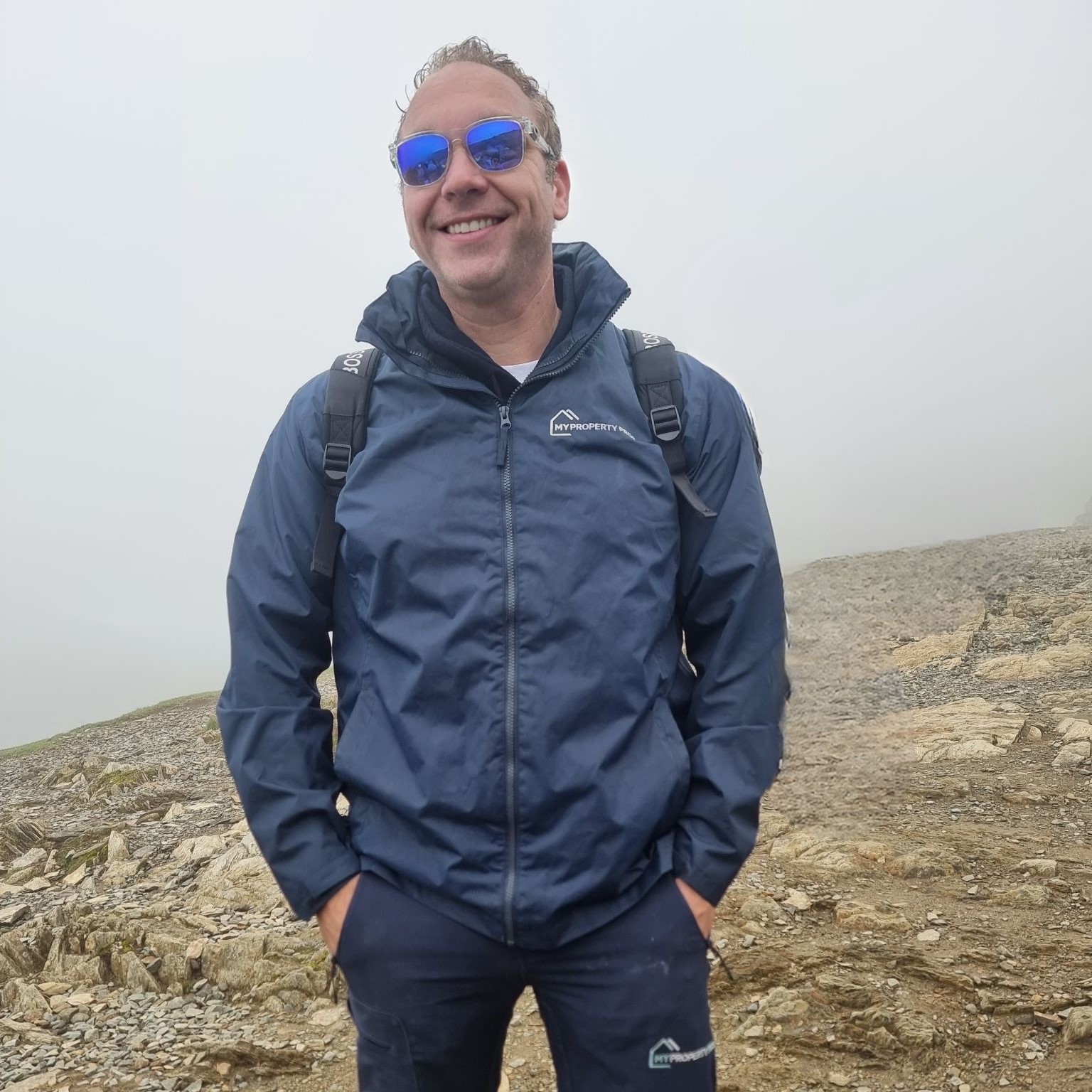 James Stoole at the summit of Snowdon